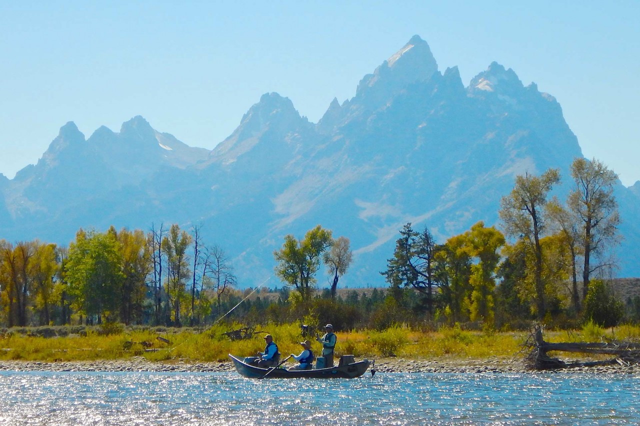 https://brevity-web-assets.s3.amazonaws.com/Grand+Teton+Fly+Fishing+.jpg